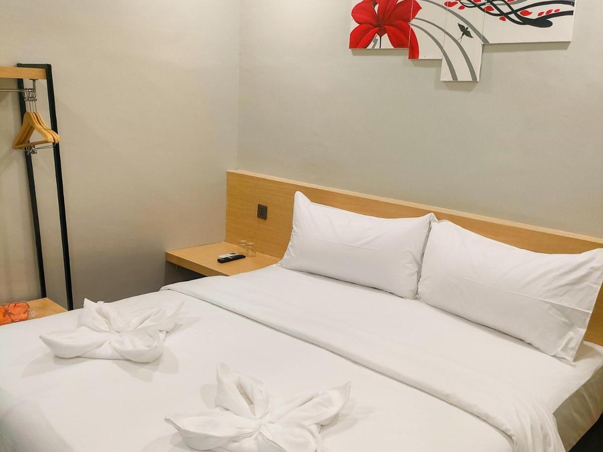 Travel Biz Hotel Medan Mitra Reddoorz Экстерьер фото